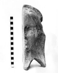 mezza testa maschile votiva