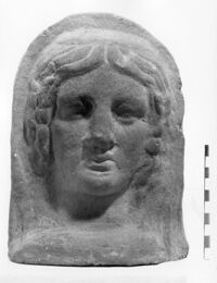 testa votiva femminile