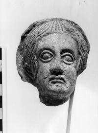 testa maschile votiva