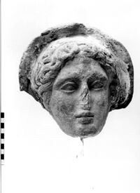 testa maschile votiva