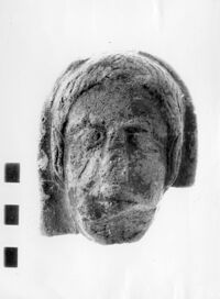 testa maschile votiva