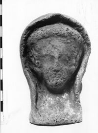 testa femminile votiva