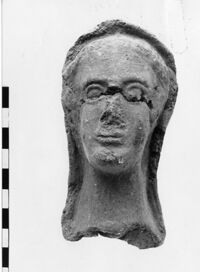 testa maschile votiva