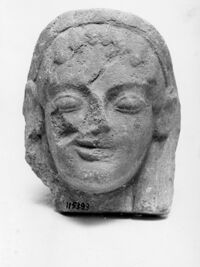 Antefissa con testa femminile