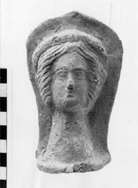 testa femminile votiva