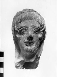 testa maschile votiva