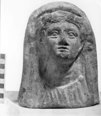 testa votiva femminile