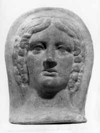 testa votiva femminile