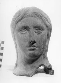 testa votiva femminile