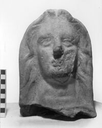 testa votiva femminile