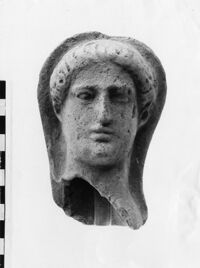 testa maschile votiva