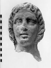 testa maschile votiva