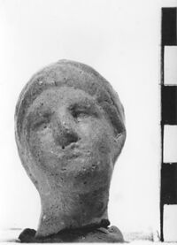 statuetta votiva femminile/ testa