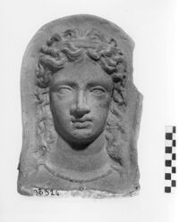 testa votiva femminile