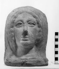 testa votiva femminile