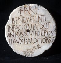 Lastra sepolcrale circolare