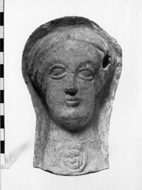 testa maschile votiva