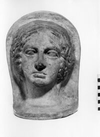 testa votiva femminile