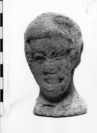 testa femminile votiva