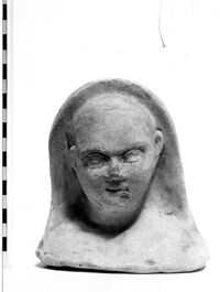 testa maschile votiva