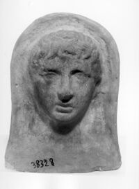 testa votiva maschile