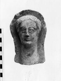 testa maschile votiva