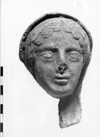 testa femminile votiva