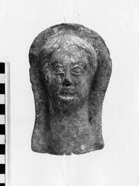 testa maschile votiva