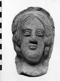 testa femminile votiva