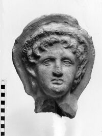 testa maschile votiva