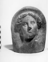 testa votiva femminile