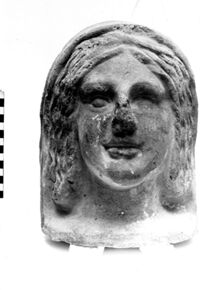 testa femminile votiva