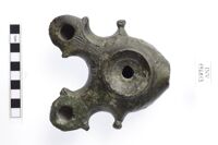 Lucerna bilicne in bronzo