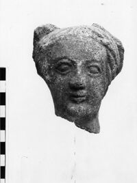 testa maschile votiva