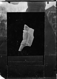 Frammento marmoreo, statuetta di Genio